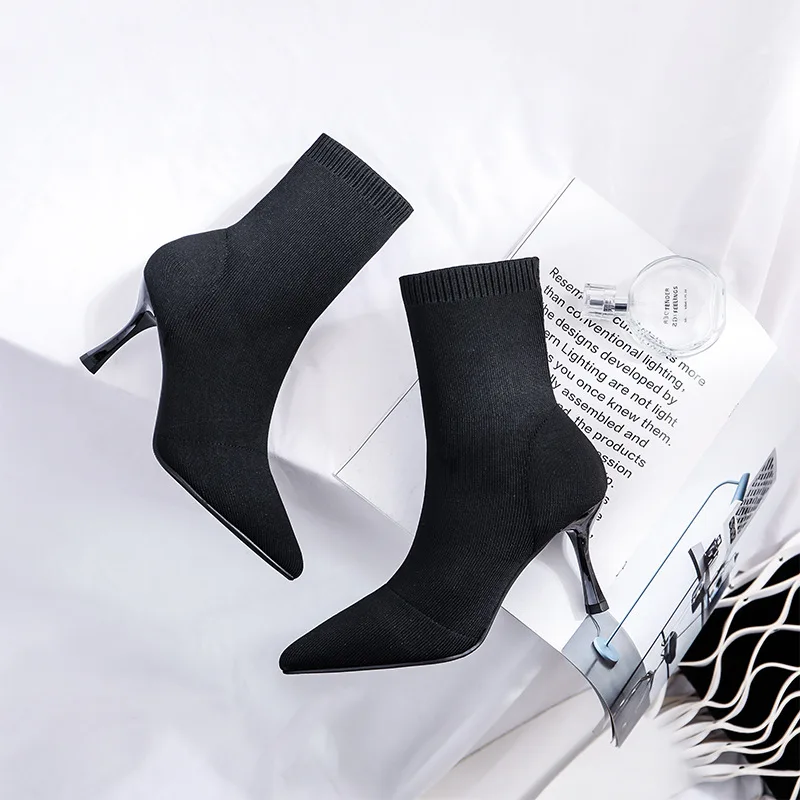 

2023 autumn and winter European and American women stretch boots high heels knitted thin heel short boots pointed boots