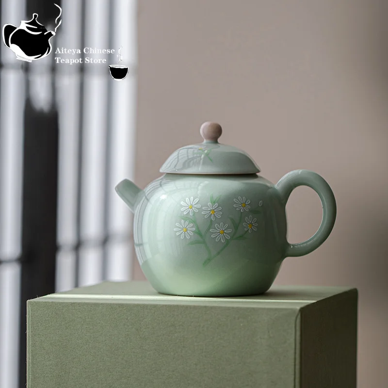 

Ceramic teapot hand-painted small daisy teapot with green glaze hand-painted ceramic teapot with filtering household teapot