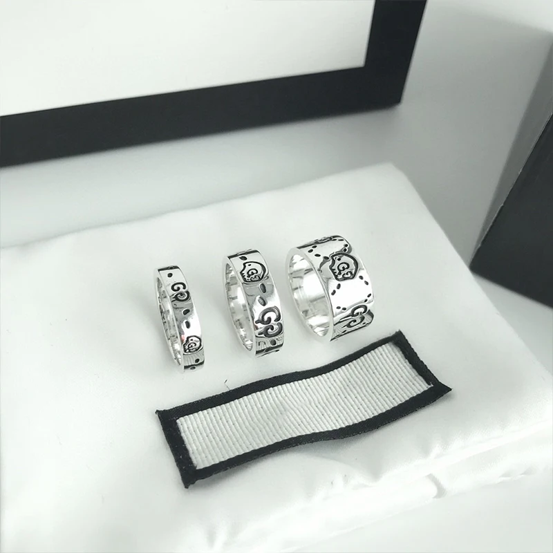 

Роскошные дизайнерские ювелирные изделия популярный бренд S925 Стерлинговое Серебро с буквой G Череп узором любовное кольцо для пар французс...