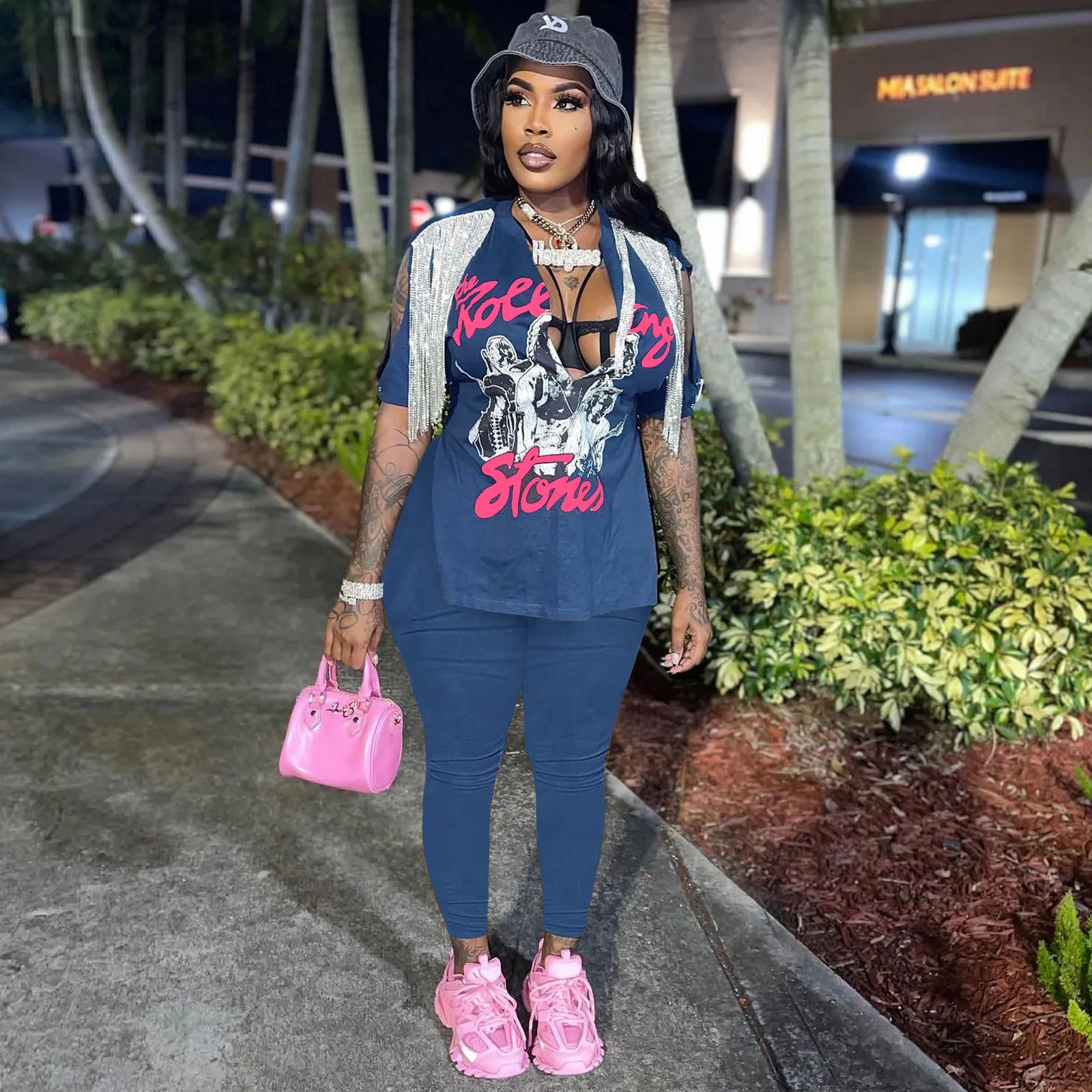 

Женский комплект из двух предметов ZOOEFFBB, модная одежда для женщин, 2022, футболки и брюки с графическим принтом и кисточками, подходящие компл...