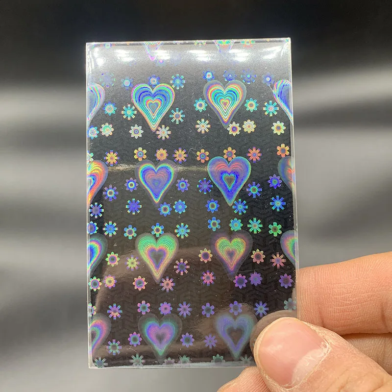

50PCS/LOT Heart Laser PP Card Sleeve Card Film Sleeves for Board Game Card Photo Protector Trading Cards Shield Cover 57*89MM