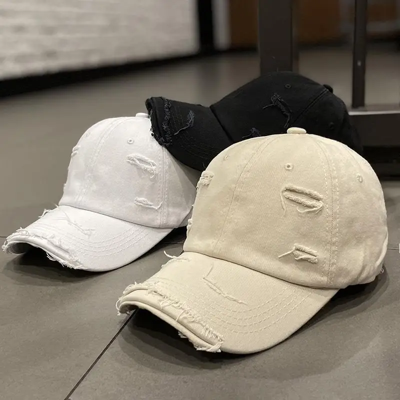 

Korean version ins solid color worn hole duck tongue hat fashion street shading curved brim baseball cap women's casual cap