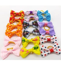 20pcsbag free sample handmade designer dog hair bows with rubber bands cat puppy dog grooming bows for hair accessories