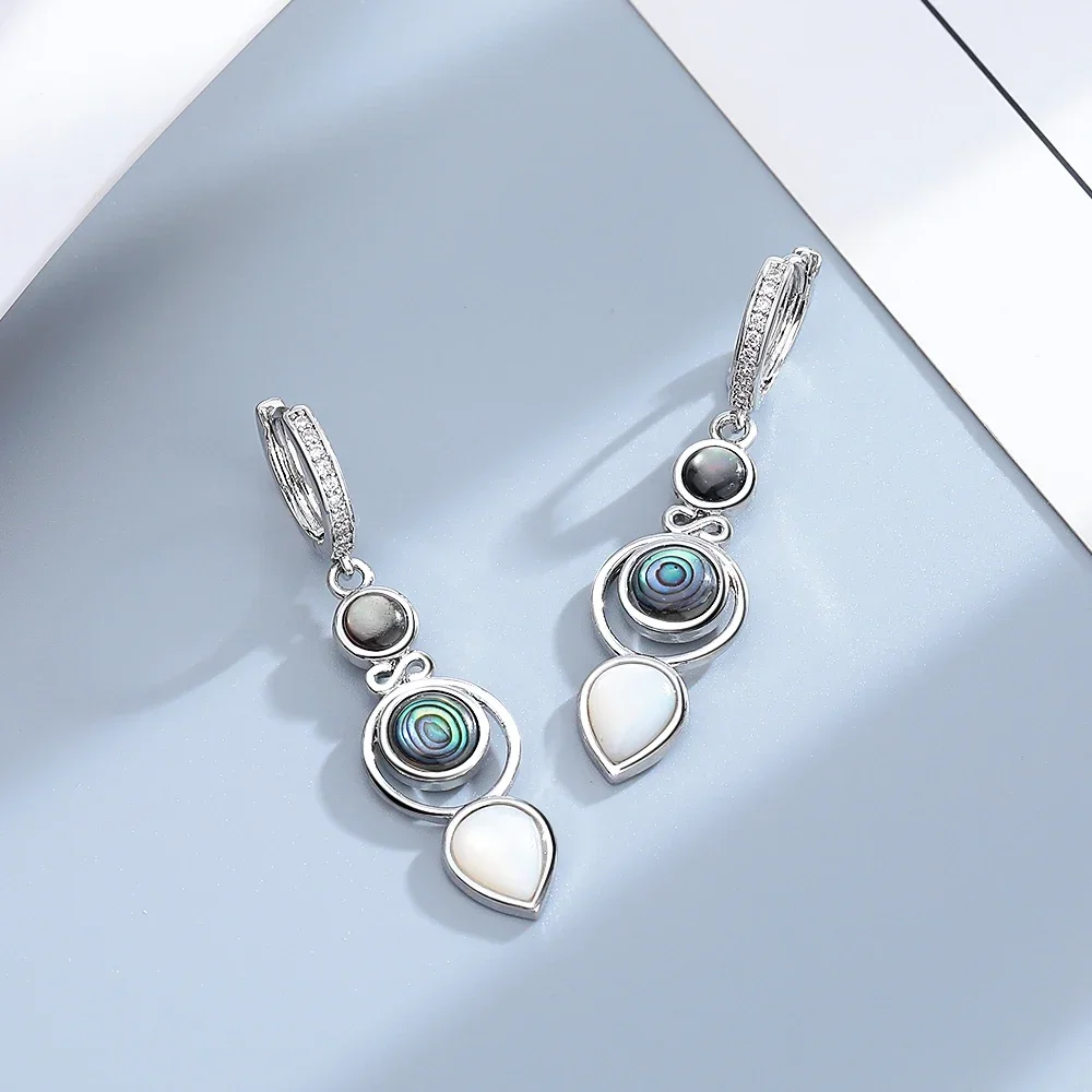 Женские серьги-кольца в виде ракушек