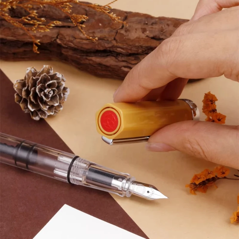 Фото Перьевая ручка TWSBI ECO Amber с прозрачным корпусом, поршневым механизмом заправки и гладким пером для каллиграфии – идеальный подарок для любителей канцелярских товаров №5