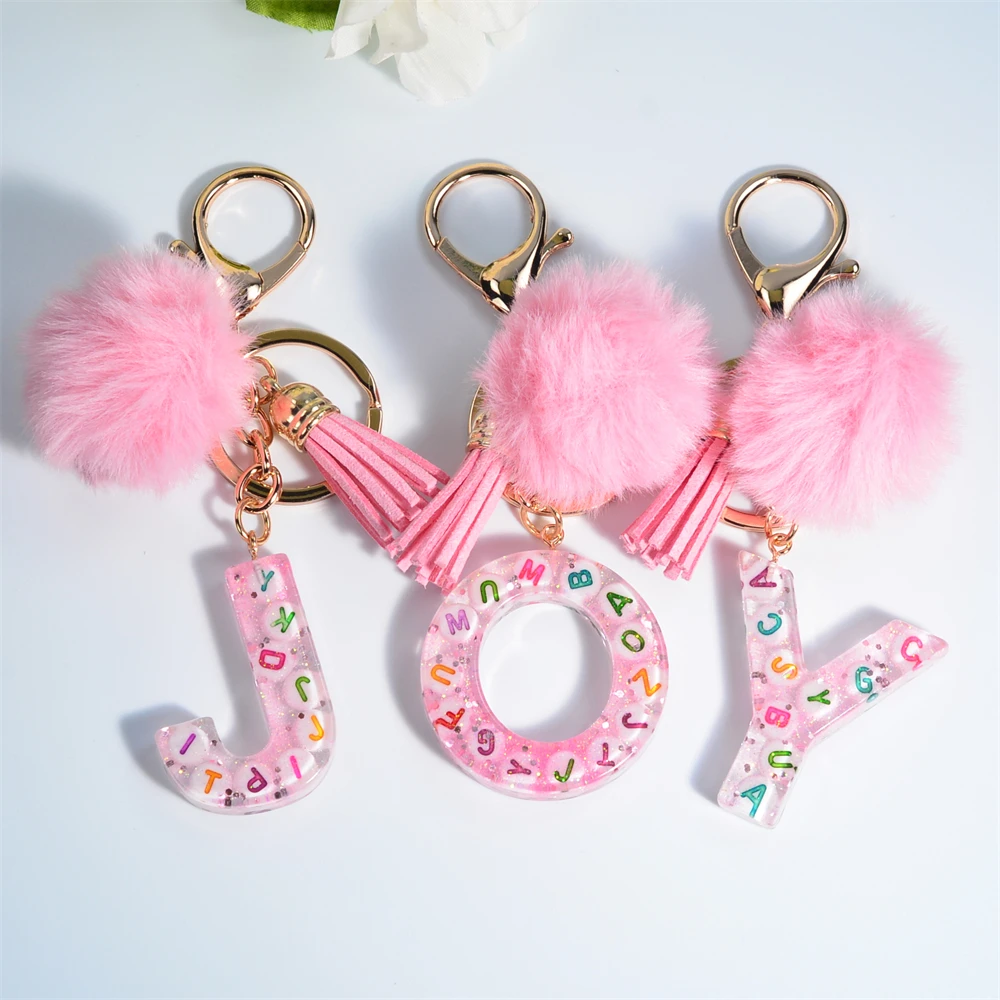 

Cute English Alphabet Pink Plush Ball Keychain Resin 26 Initials Keyring Sequins Filled Key Chain Tassel Charm Pendant Accessory