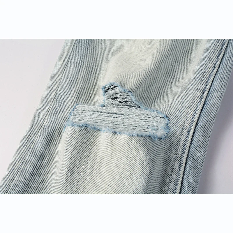 Новые поступления мужские пуговицы выцветшие синие рваные джинсы в американском