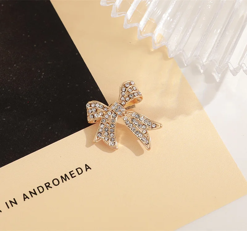 

Crystal Bow Knot Brooch Pin Metal Button For Shirt Anti Exposure Collar Brooches Buckles Accessories Sweater Ornament Jewelry
