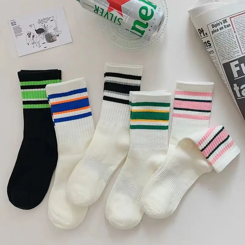 

Japanese white striped sports mid-tube cotton socks spring and autumn ins tide net red style outerwear Korean version stockings