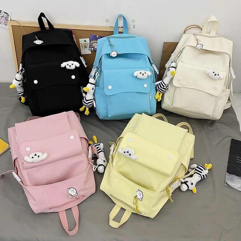 

Fashion Women Backpack New Solid Color Trend Nylon School Bag For Girls Kawaii Duck Pendant Large Capacity Student Bookbags 2022