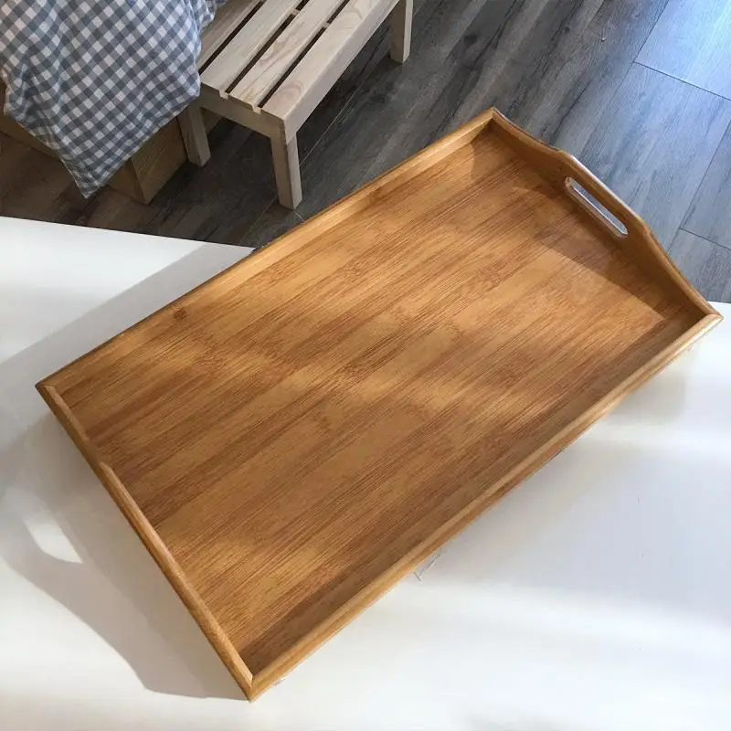 На кровати маленький стол из бамбука массива дерева для студентов ленивый