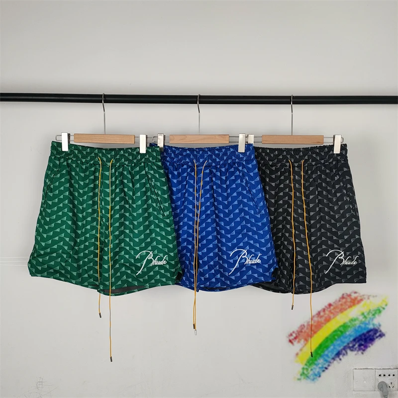 

2023fw Rhude Shorts Men Women Best Quality Drawstring Triangle Plaid Oversized Embroidery Breeches