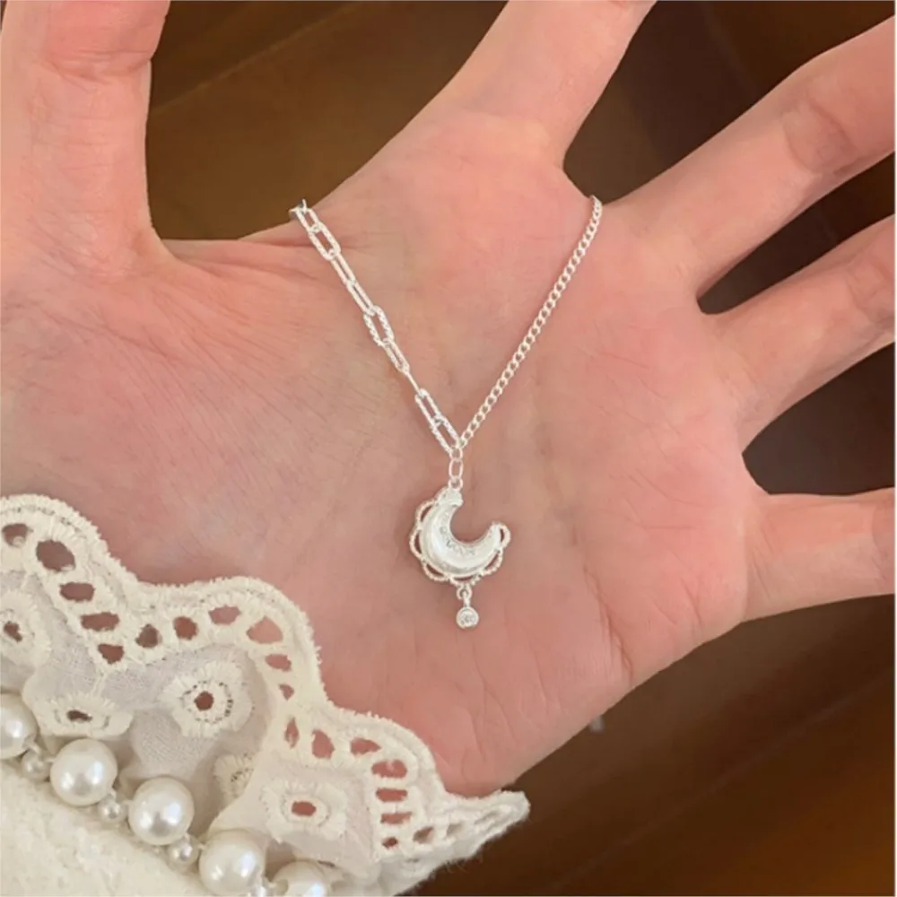 Фото PANJBJ Колье из серебра 925 пробы с луной для женщин, кулон с цирконом в виде кружева, асимметричный матовый милый дизайн, ювелирное изделие в подарок, дропшиппинг. №1