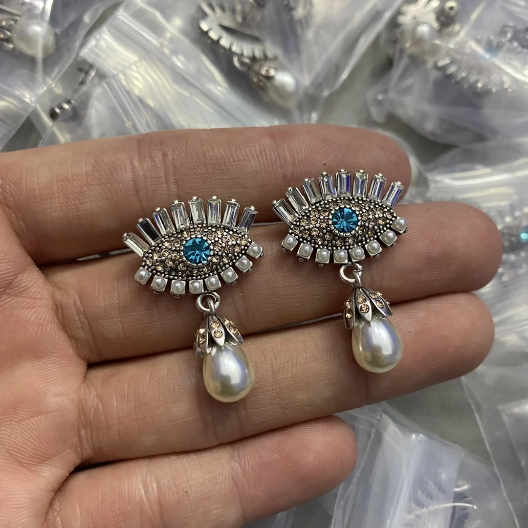 

Light luxury ear studs eye-tassel zircon high-grade sense earrings new women