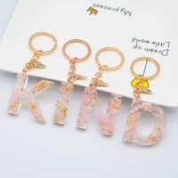 26 english letters spot fashion ladies bag pendant pale pink floral gold foil glue resin keychain