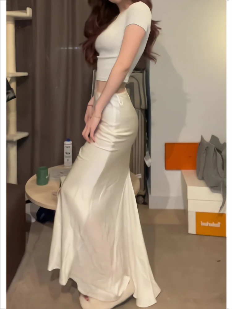 Популярная в этом году модная темпераментная утягивающая юбка с высокой талией