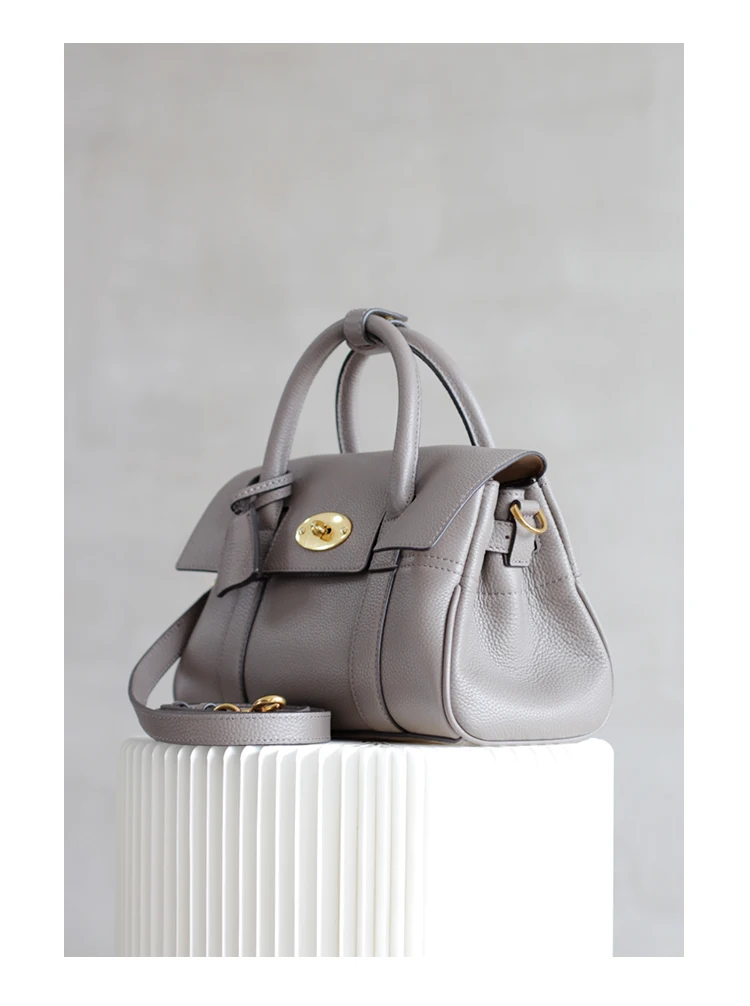 

Simple and charming small handbag female Boston bag