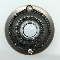 solid brass lighted wired doorbell push button stamped with a flower design 1652l