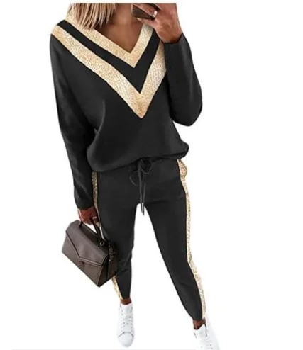 

Новый женский брючный костюм с бисером