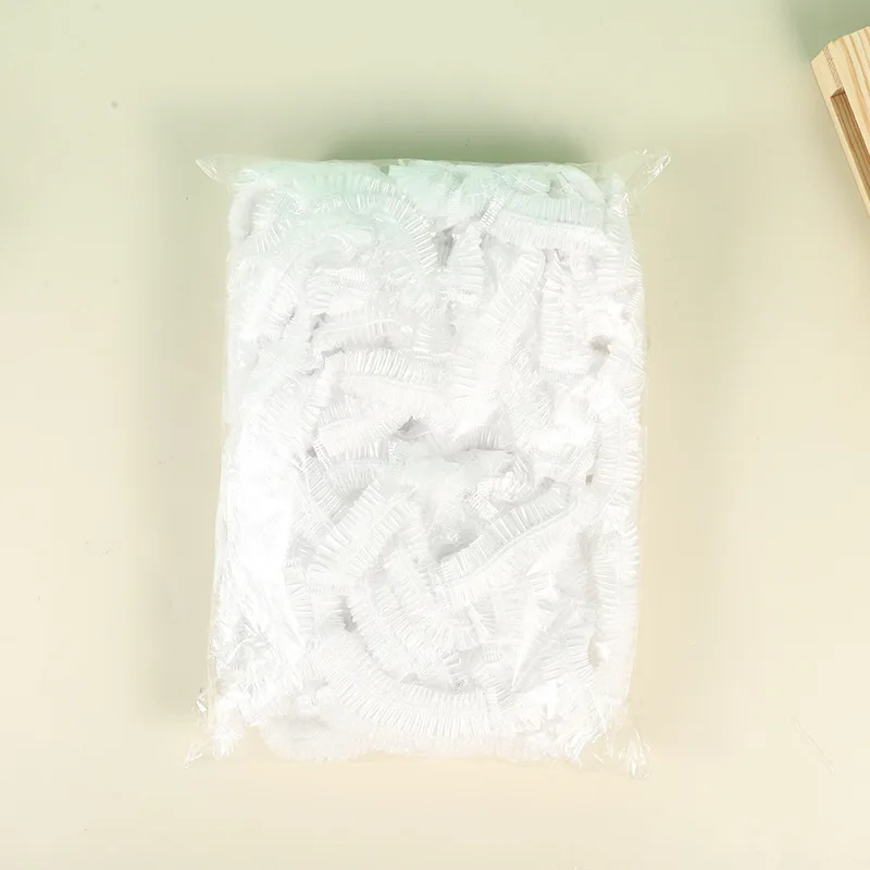 

Одноразовые пластиковые шапочки для душа 100 шт.