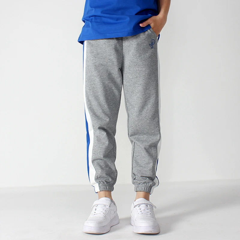 Детская одежда спортивные брюки модные с принтом по бокам на весну и осень