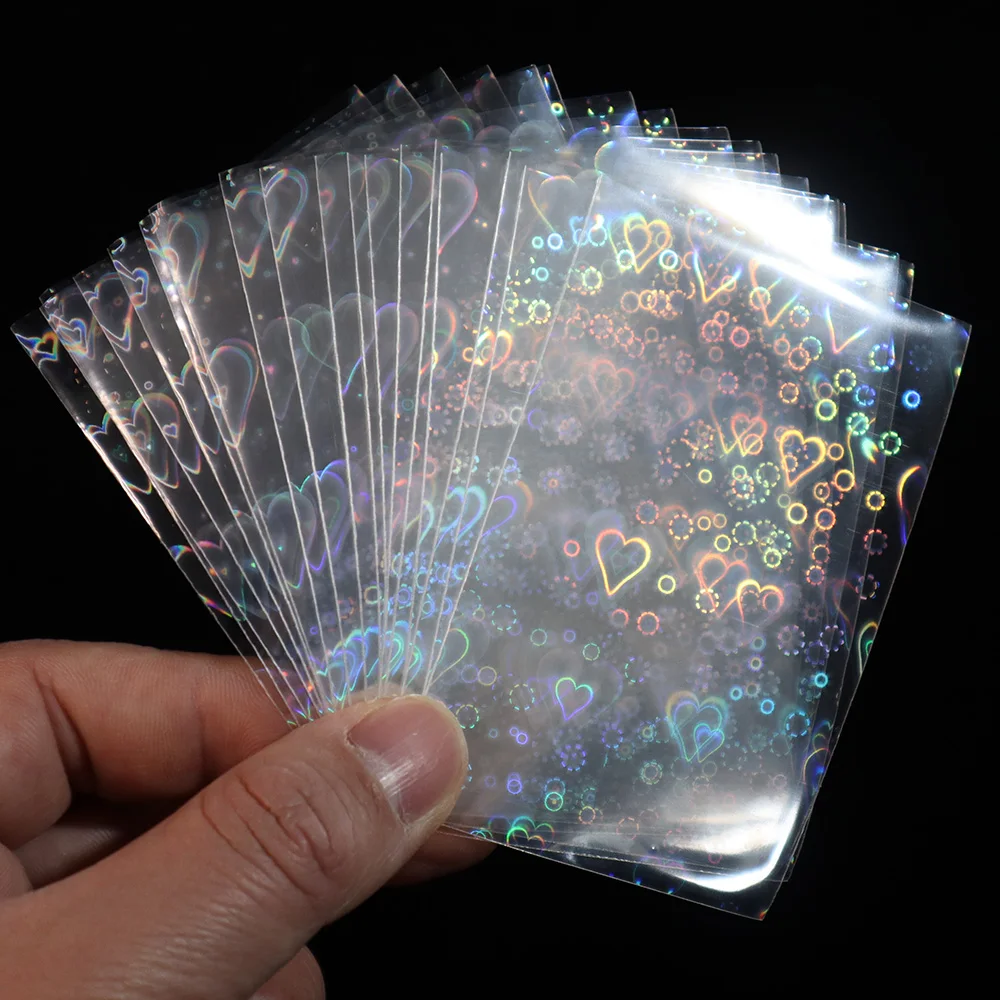 

100 pcs/set laser love Holographic Foil Protective Film Laser Flashing Card Sleeves Protector for Cards Holder