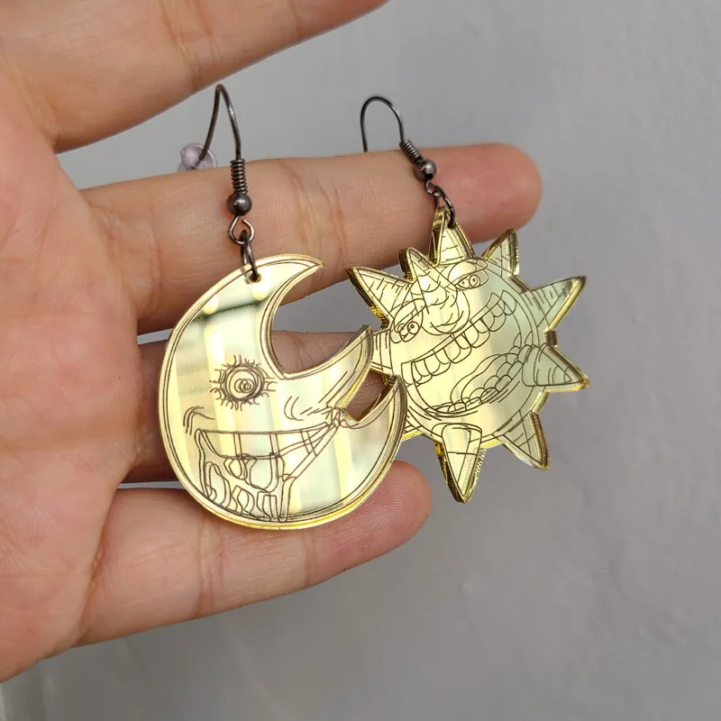 

Laughing Sun and Moon Gold Mirrored Acrylic Earrings