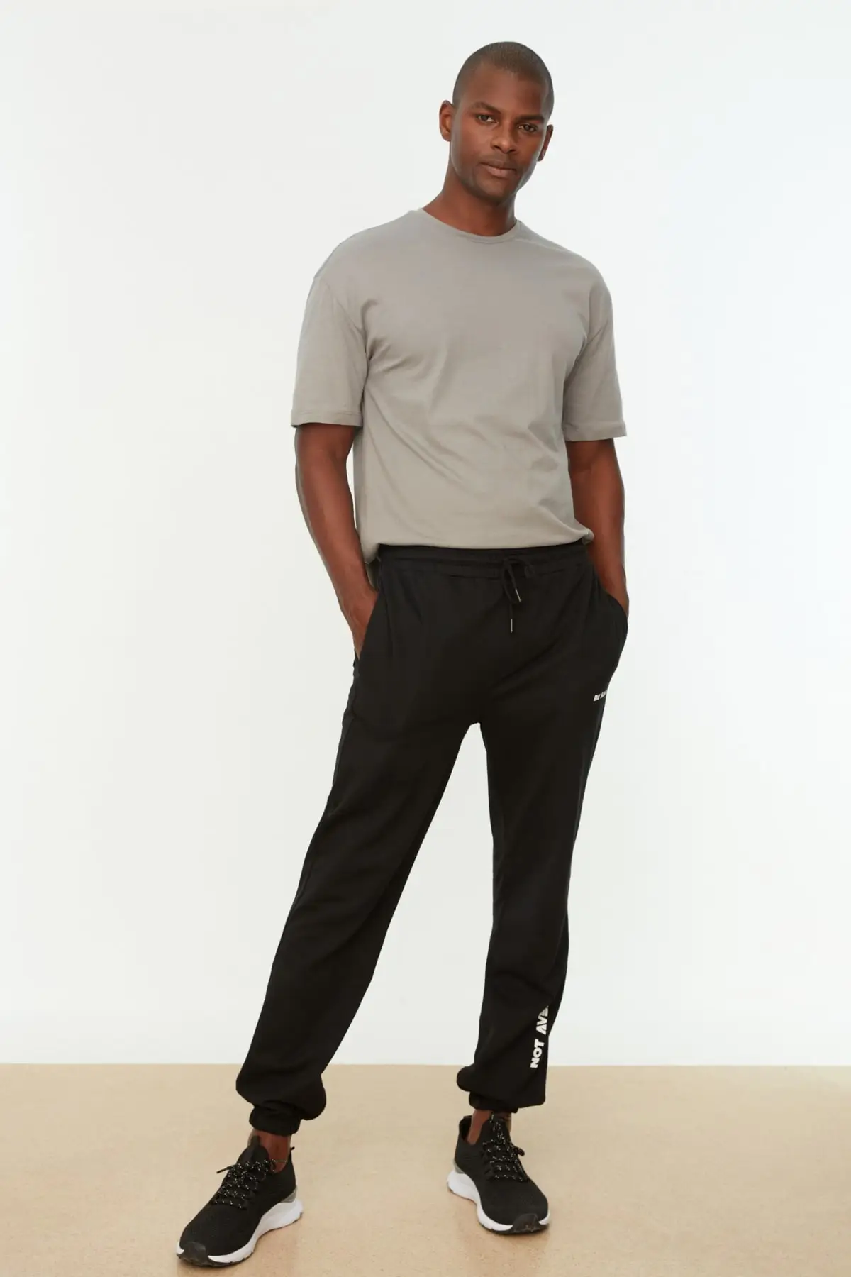 

Men's Regular Fit Printed Sweatpants TMNSS22EA0046