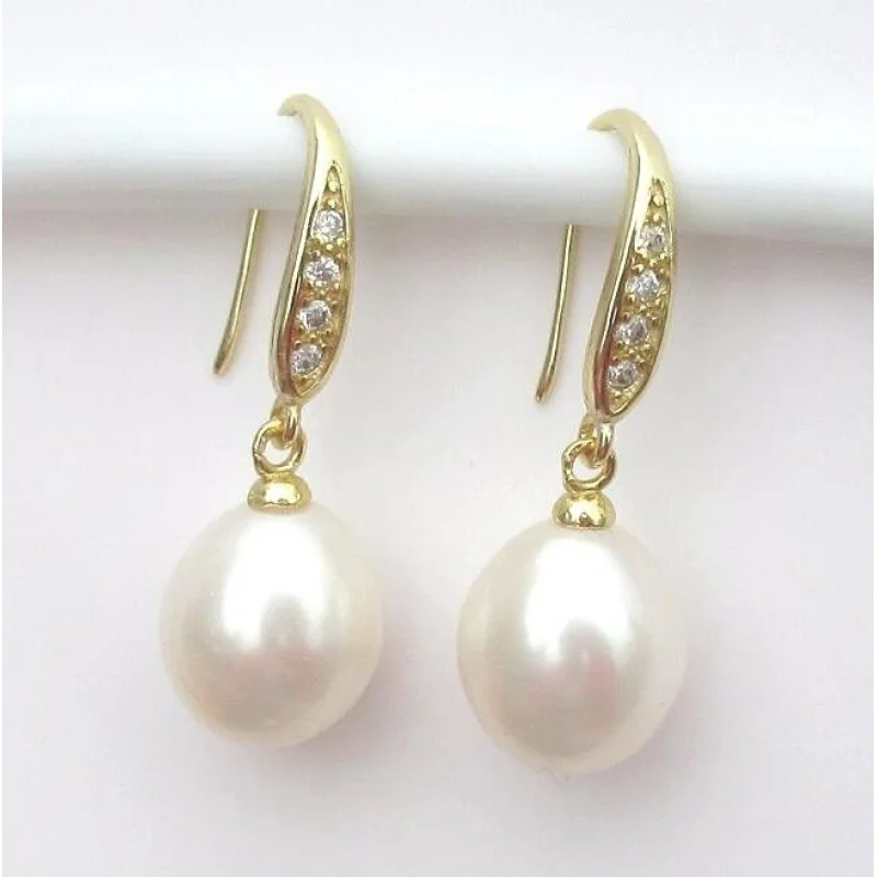 

a pair of natural AAA 9-12MM south seas white pearl earrings
