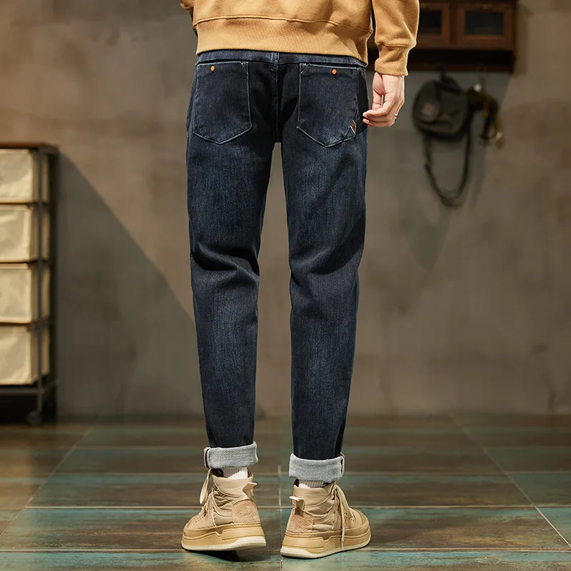Autumn and winter small leg jeans men's casual twill durable denim trousers elastic slim simple comfortable young men's trousers