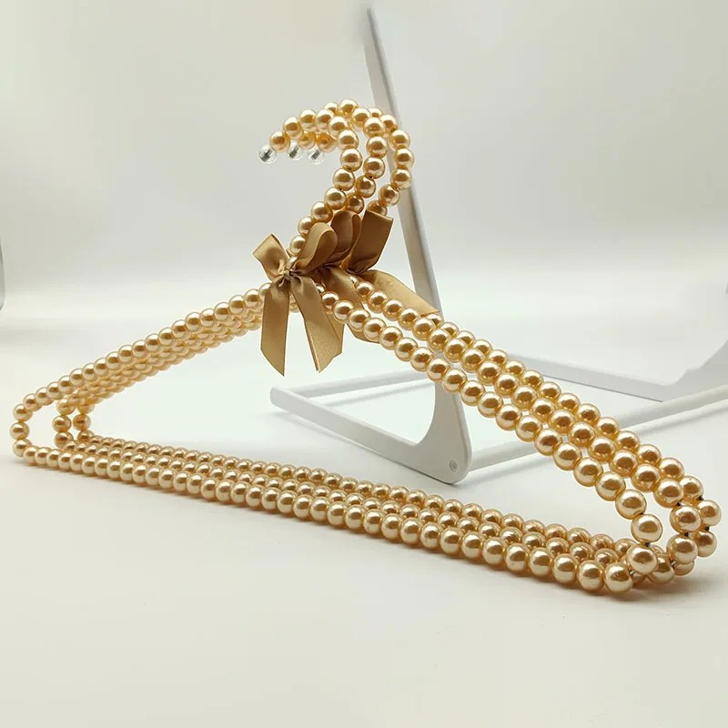 

2pcs Baby Clothes Hanger Pearl Bow Rack Dog Hanger Plastic Pearl Bead Clothes Hanger Pet Cat Clothing Kid Adult Hanger Organizer