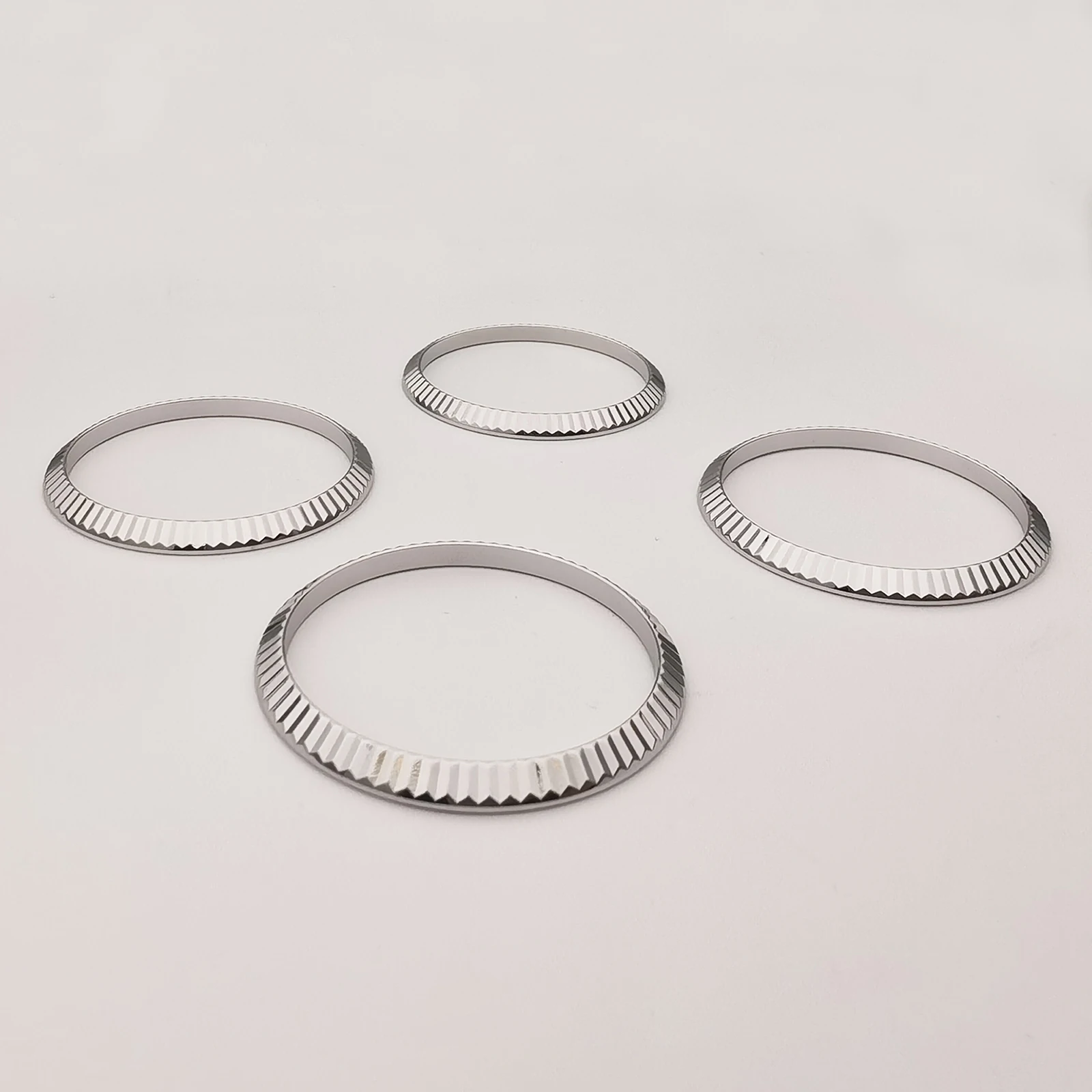 Фото Позолоченный белым золотом рифленый безель для RLX Datejust 36 мм, подходит для моделей 126234, 116234, 126200, высококачественная запасная часть для часов. №1