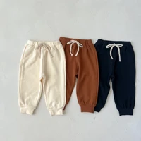2022 autumn new childre drawstring sports pants gilr pure color loose casual trousers boy all match cotton pnats baby costume