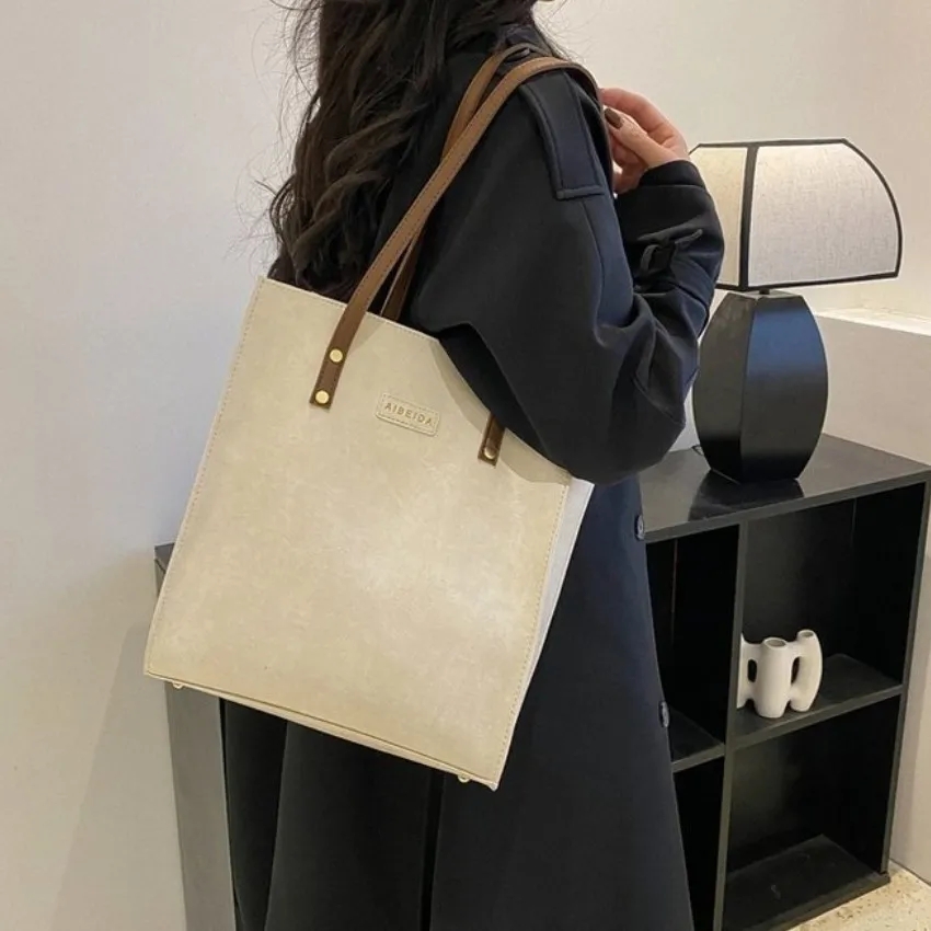 

Модная Изысканная сумка для покупок в новом стиле, повседневные женские сумки-тоуты в стиле ретро, сумки на плечо, женская кожаная однотонна...