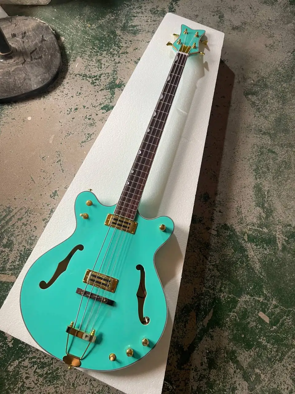 

Semi Hollow 4 Strings Blue Body Electric Bass Guitar with Gold Hardware,Rosewood Fretboard,Provide Customized Service