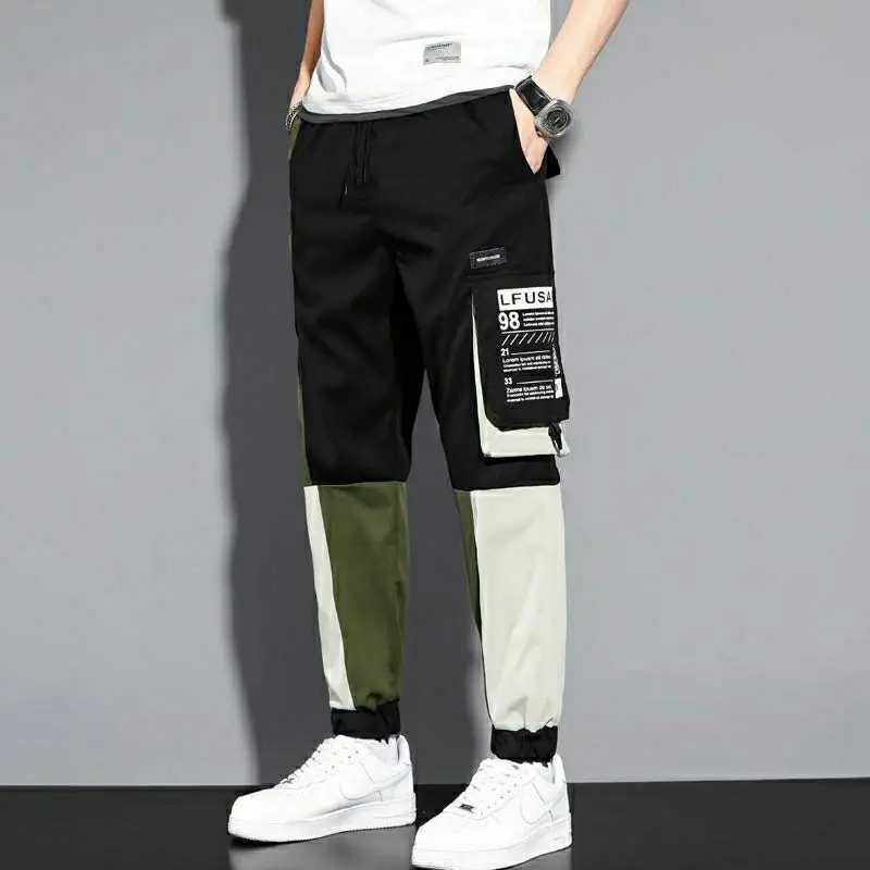 Брюки-карго мужские эластичные с карманами и надписью