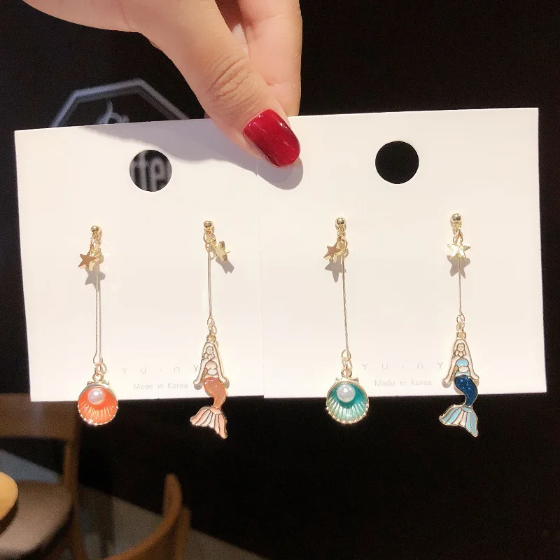 

Mermaid shell pearl earrings women's long temperament high-end sense super fairy asymmetric earrings