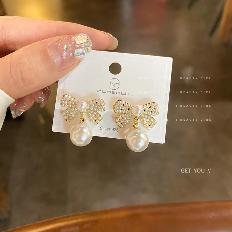 

Fashion Temperament Silver Needle Pearl Bow Earrings Baroque Retro Small Fresh