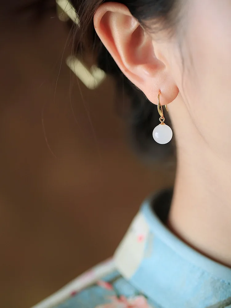 

Женские серьги золотого цвета в форме капли воды, дизайнерские светлые роскошные темпераментные серьги с белым драгоценным камнем