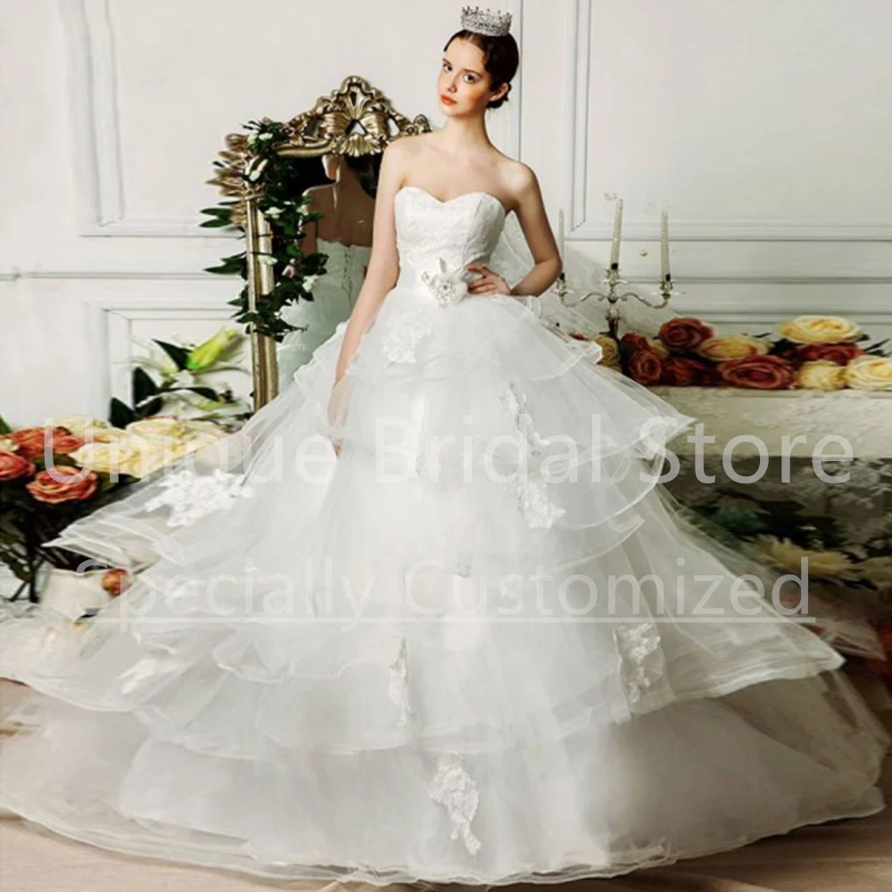

Classic A-Line Bridal Dress Sweetheart Backless Zipper Sleeveless Applique Tiered Organza Brush Train Bridal Dresses Bride Gown