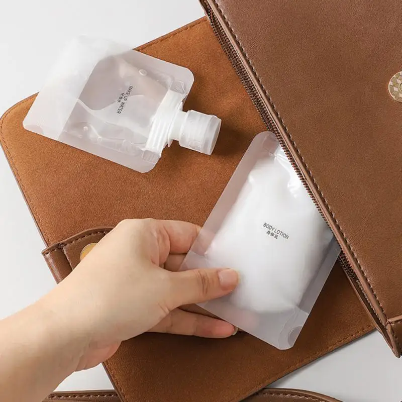 

5PCS Portable Travel Liquid Packaging Bag Lotion Dispenser Bag Refillable Shampoo Cosmetic Storage Container 30ml 50ml 100ml