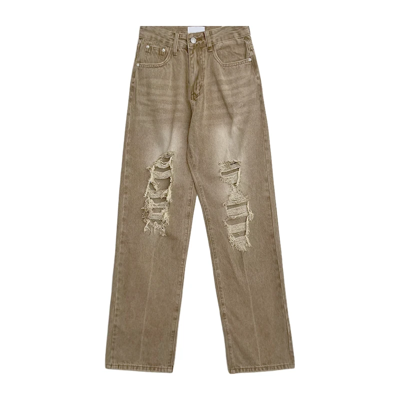 

Джинсы с высокой талией и дырками в стиле ретро