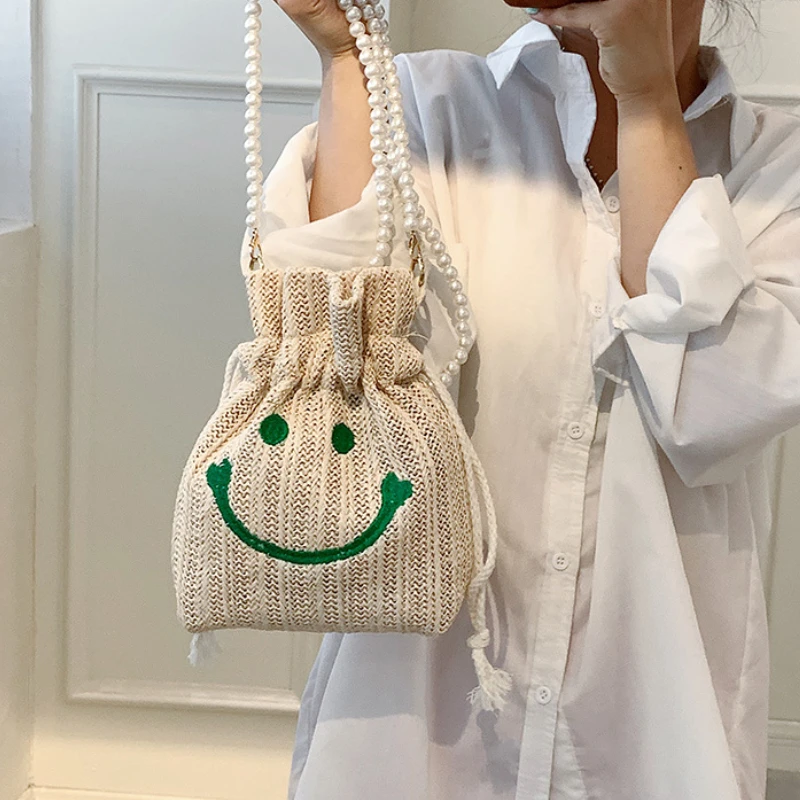 

Cute Smile Printed Pearl Chain Casual Straw Bucket Bag High-quality Drawstring Luxury Designer Handbags for Woman 2022Summer New