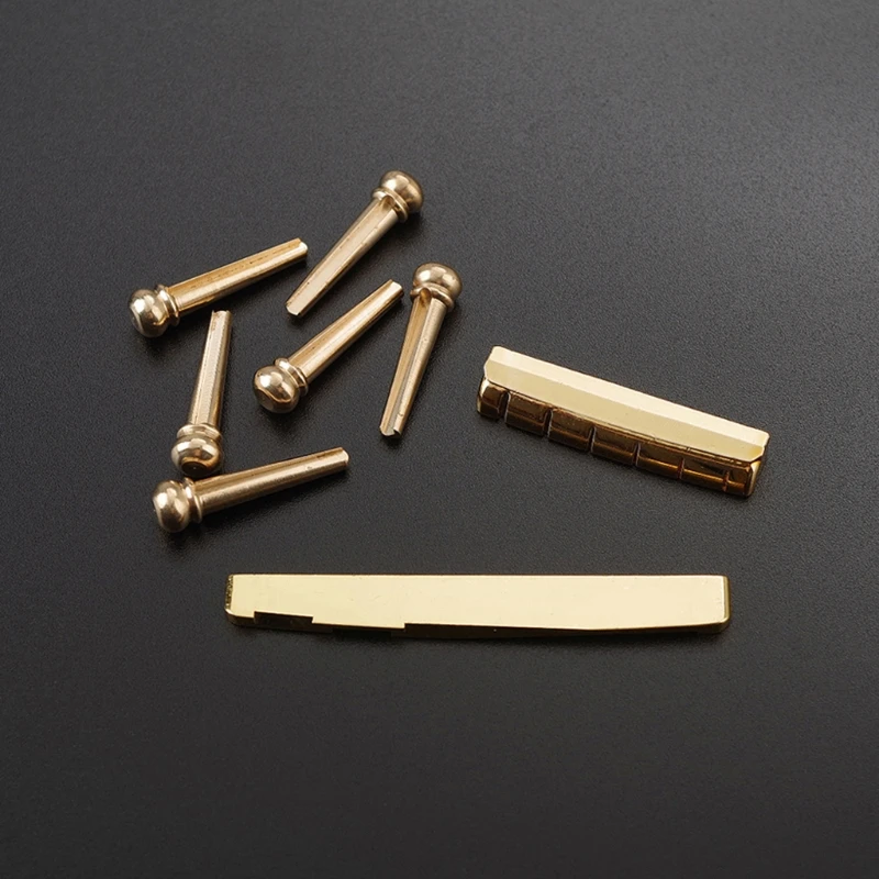 

Guitar Brass 6 String Slotted Golden Plated Acoustic Guitar Nut and Bridge Saddle Guitar Parts Gold Parts Accessories