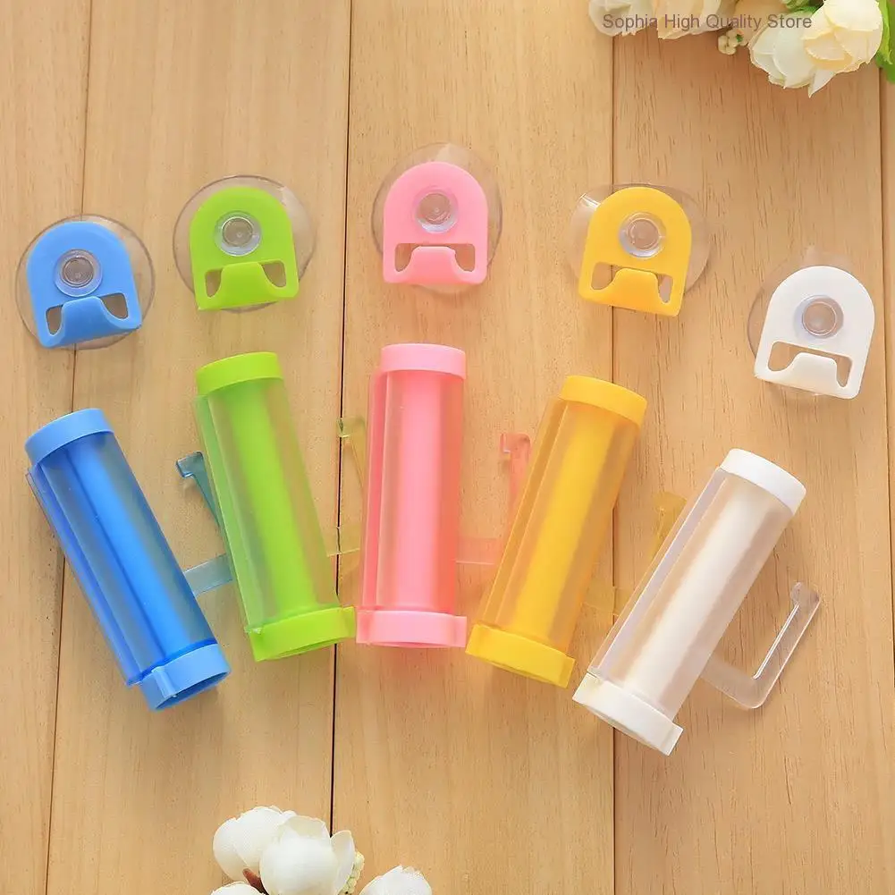 

1pcs ABS Cute Rolling Squeezer Toothpaste Dispenser Tube Partner Sucker Hanging Holder distributeur dentifrice