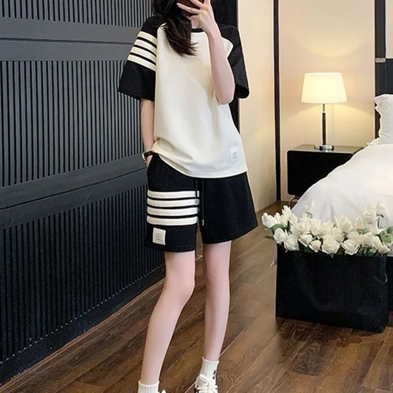 

Women's New Set Summer 2023 Sports Set Casual Fashion Loose and Slim Round Neck Short Sleeve Shorts Two Piece Set