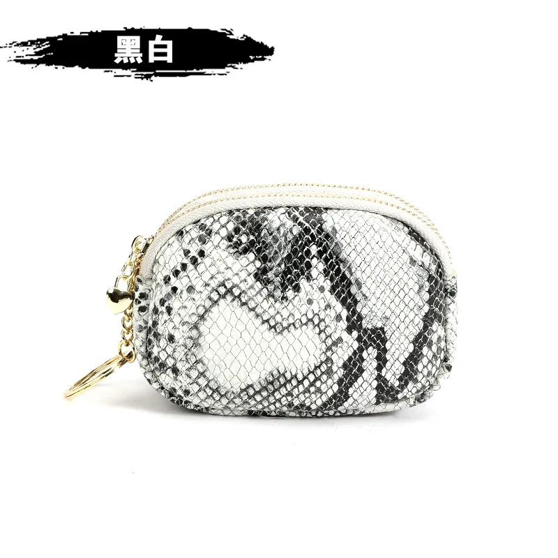 Вместительные двойные молнии из натуральной кожи с змеиным узором |