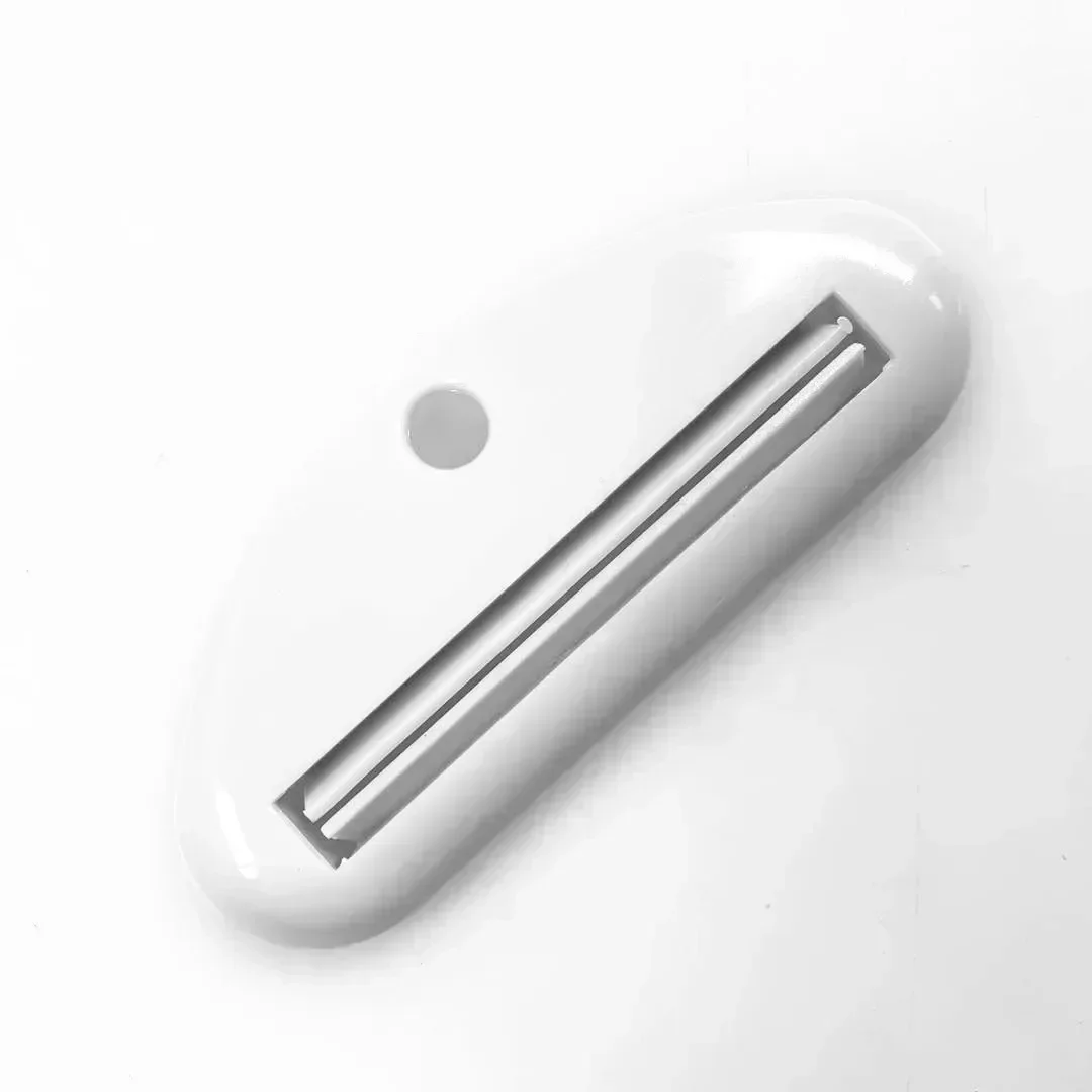 

Соковыжималка для зубной пасты Держатель для зубной пасты Уход за полостью рта Инструменты для ванной комнаты Тюбик Косметический пресс Очищающее средство для лица Роликовый сжимающий дозатор