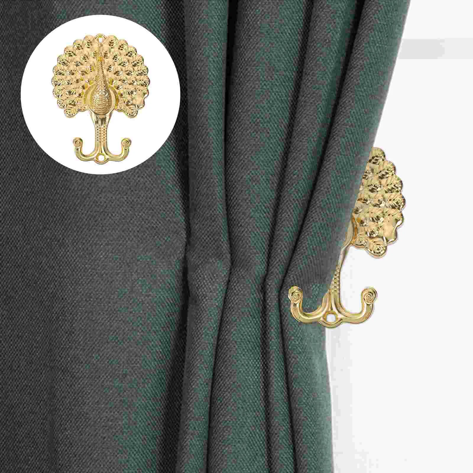 Держатель для одежды в виде павлина