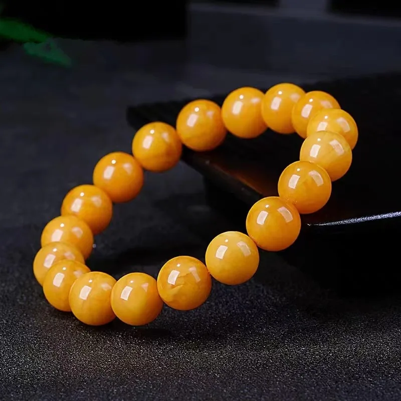 Женский желтый восковой янтарный браслет